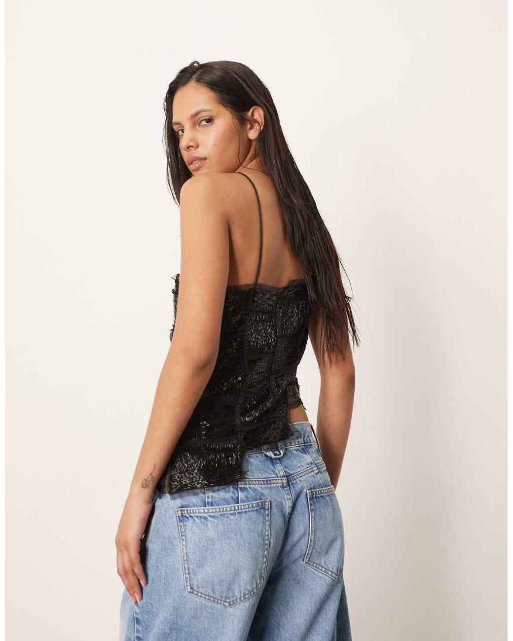 ARRANGE Blue Embellished Asymmetric Top With Raw Edge