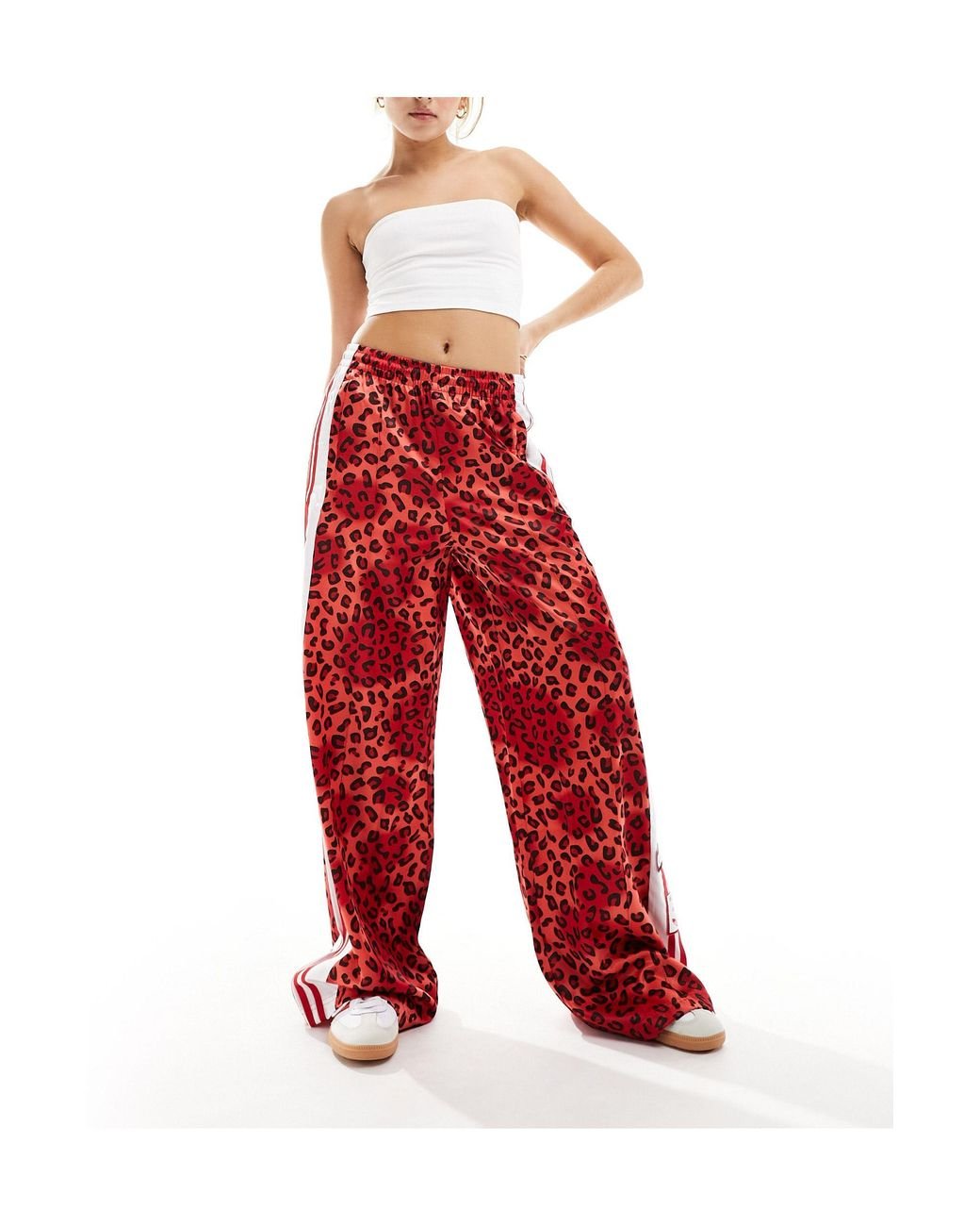 Leopard pants best sale with red stripe