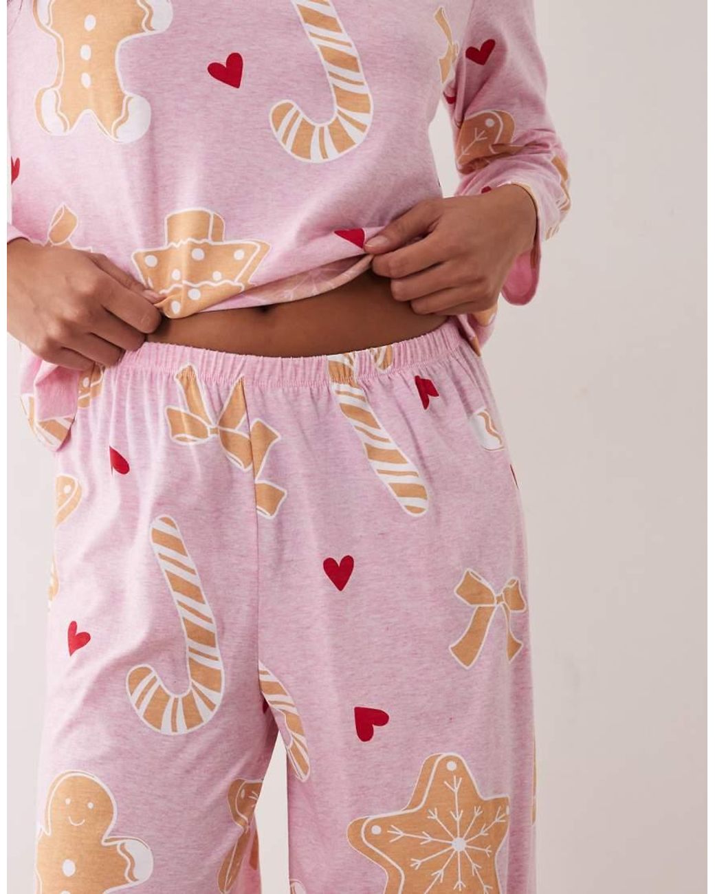 ASOS Pink Asos Design Petite Long Sleeve Top & Wide Leg Trouser Pyjama Set With Sweets Graphic
