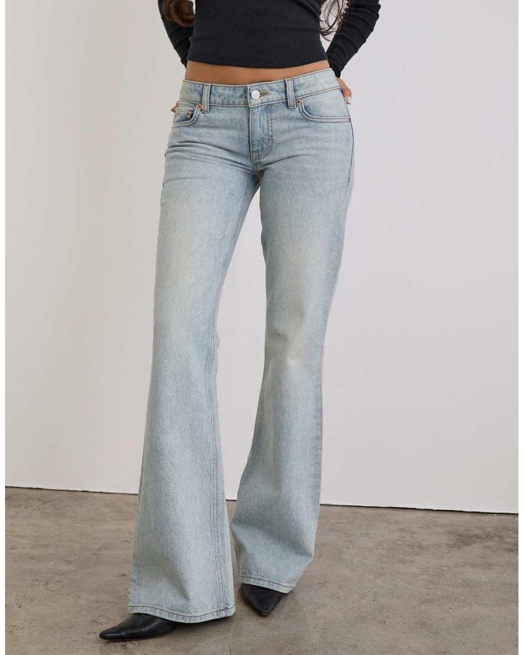 Motel Extra Low Rise Flare Jeans in White | Lyst UK