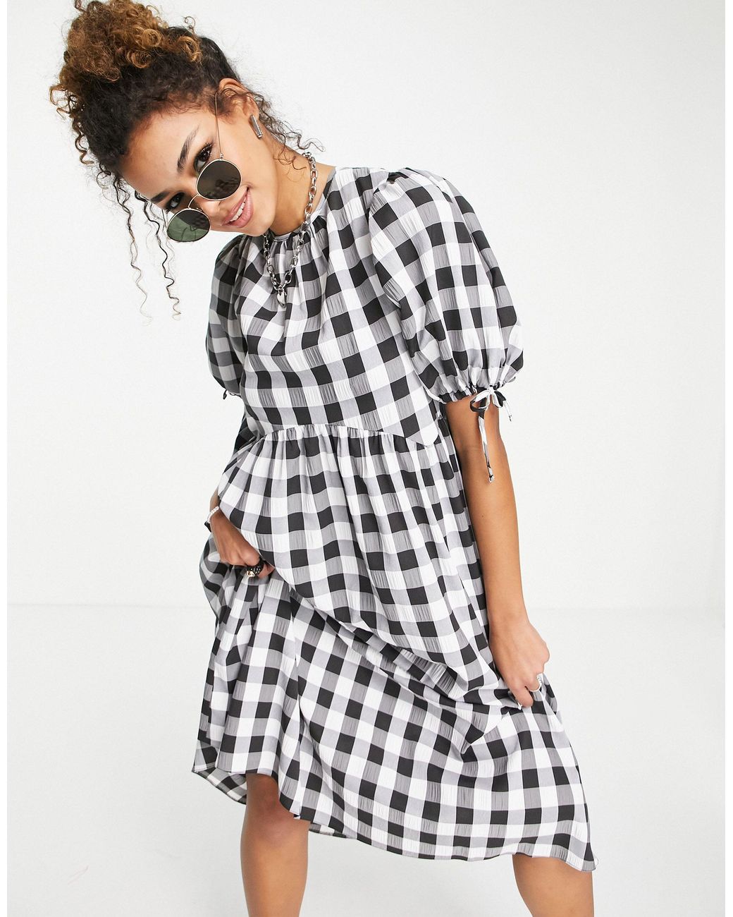 Vestito bianco e nero a quadretti sale