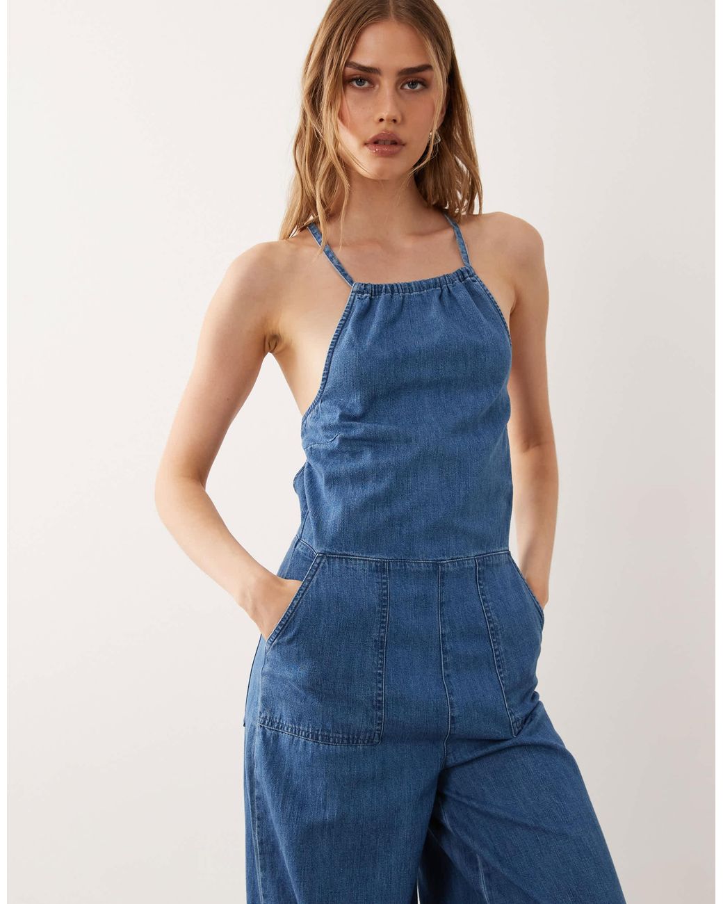 ASOS Blue Halter Neck Denim Jumpsuit With Patch Pockets