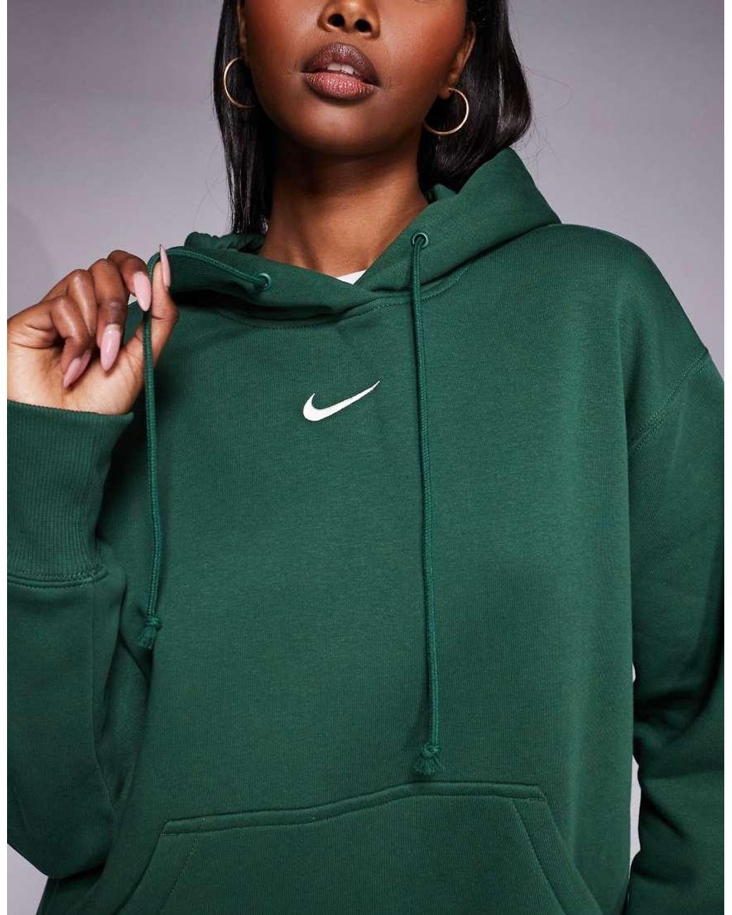 Nike Phoenix Fleece in het Green