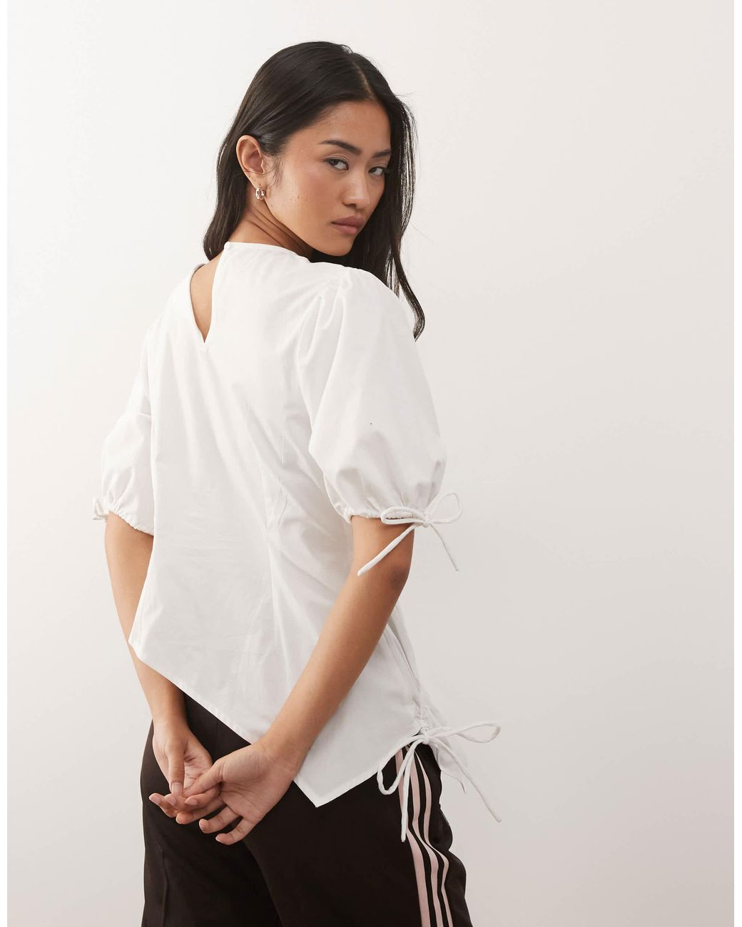 Blouse avec liens Collusion en coloris White