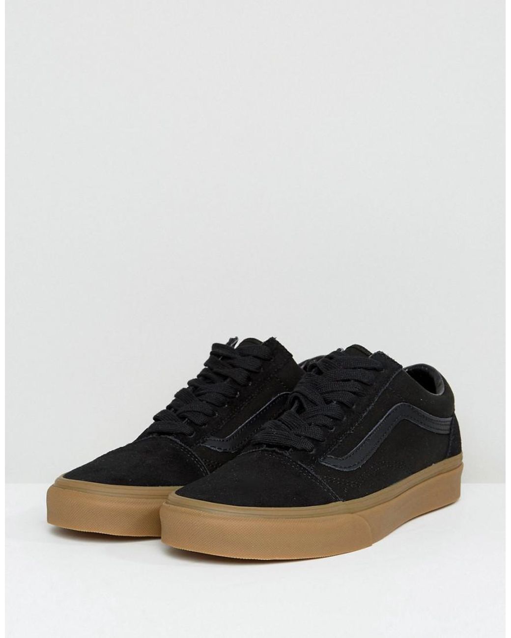 All black vans with gum sole discount