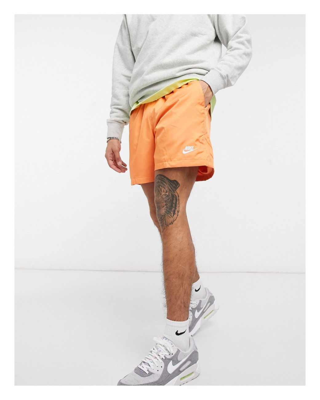 Nike Club Essentials Woven Flow Shorts in Orange for Men | Lyst