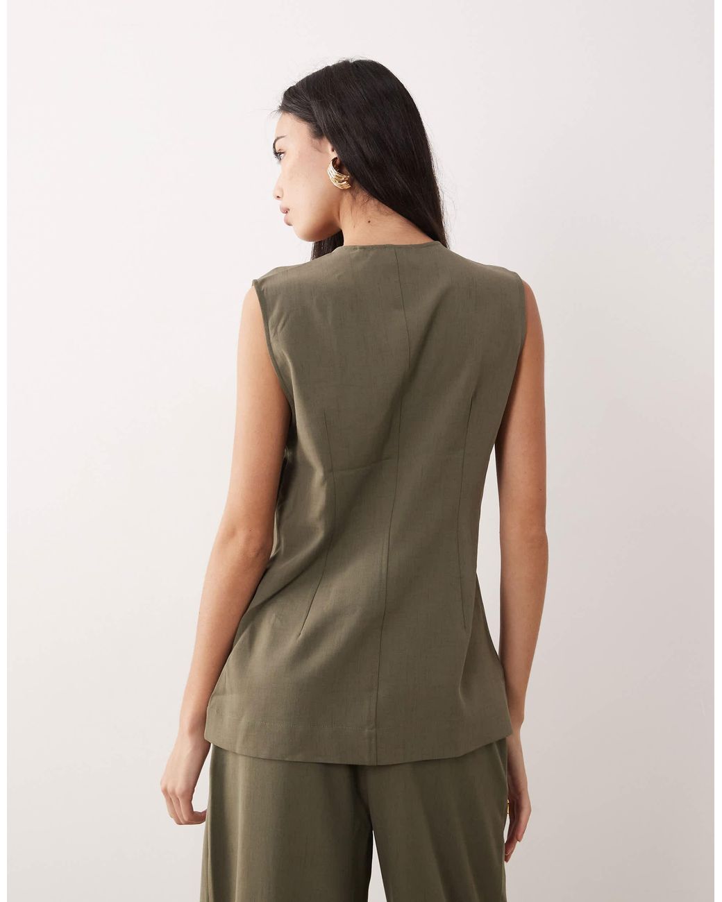 Aware Green – elegante longline-weste