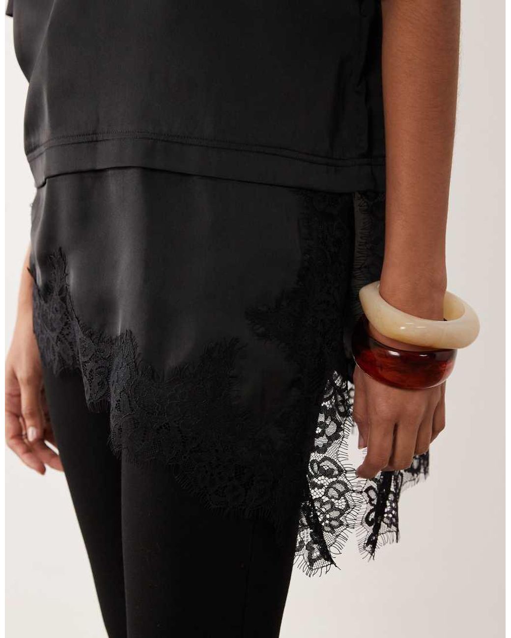 Wednesday's Girl Black Satin T-Shirt With Asymmetric Lace Hem