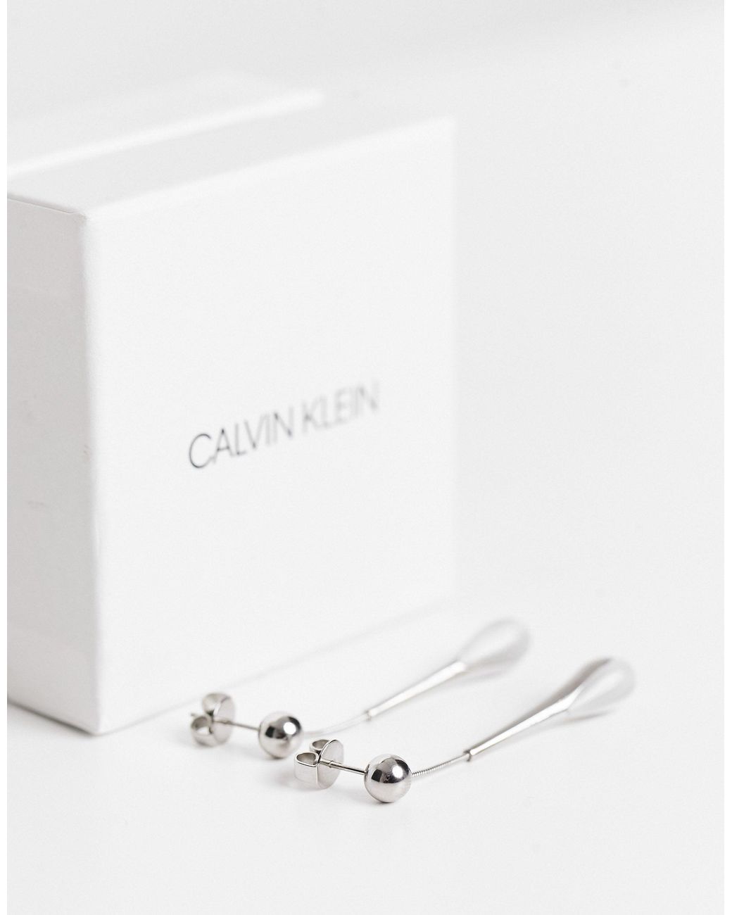 Calvin Klein – farbene tropfenohrringe mit verzierung mit weißem stein in  Mettallic | Lyst AT