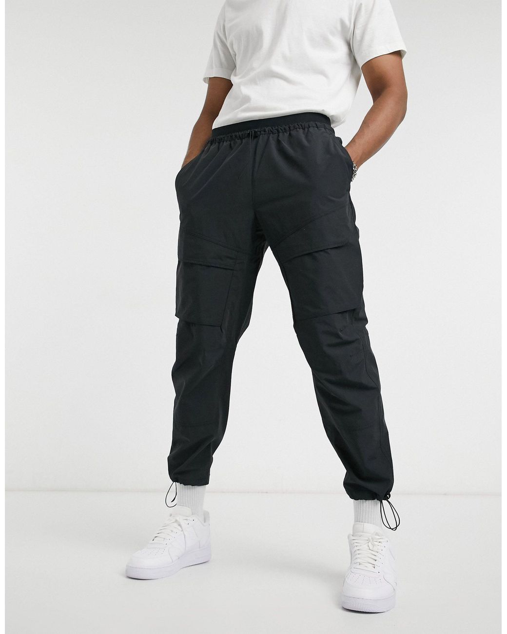 Nike Cotton Tech Pack Woven Cargo joggers in Black for Men | Lyst Australia