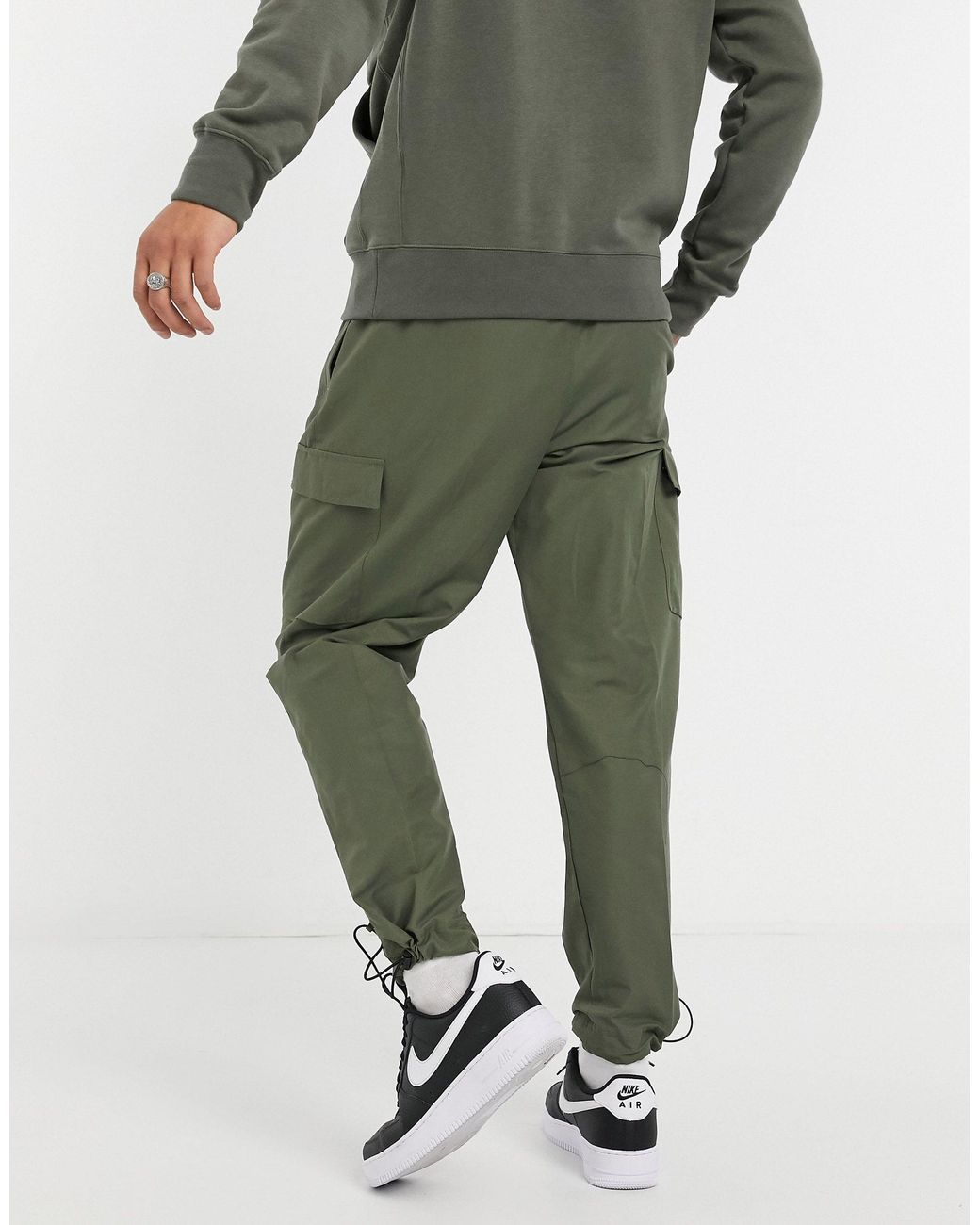 Nike Club Essentials Woven Cargo joggers in Green for Men Lyst