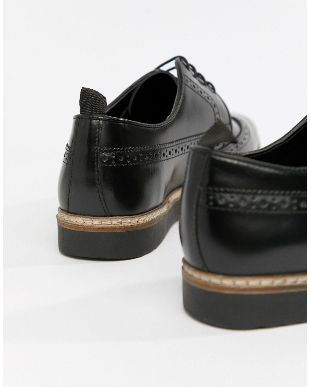 black wedge brogues