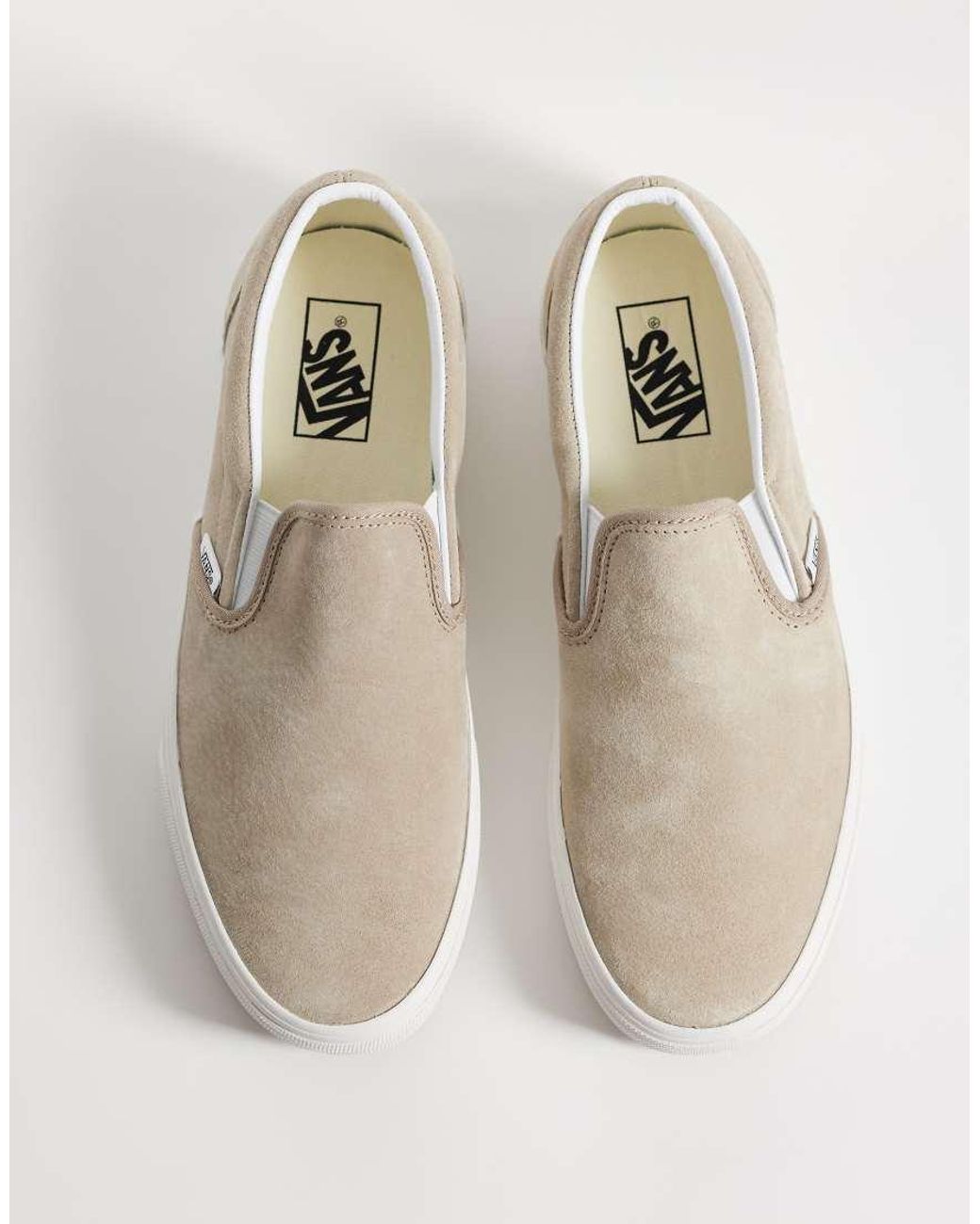 Vans White Classic Slip-on Sneakers