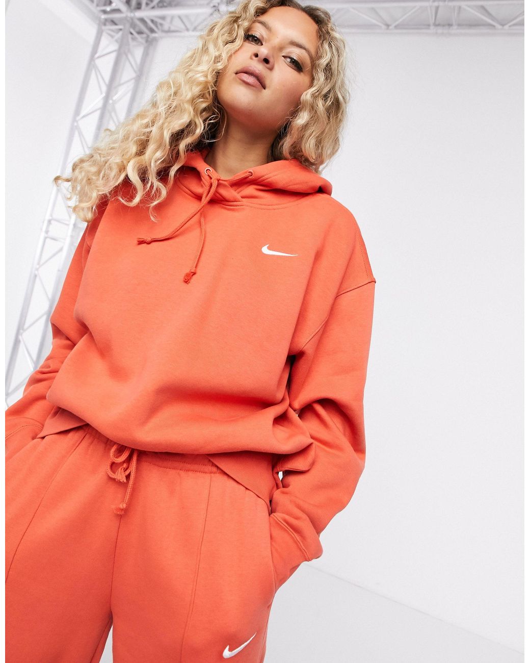 Nike Mini Swoosh Oversized Hoodie in Red | Lyst