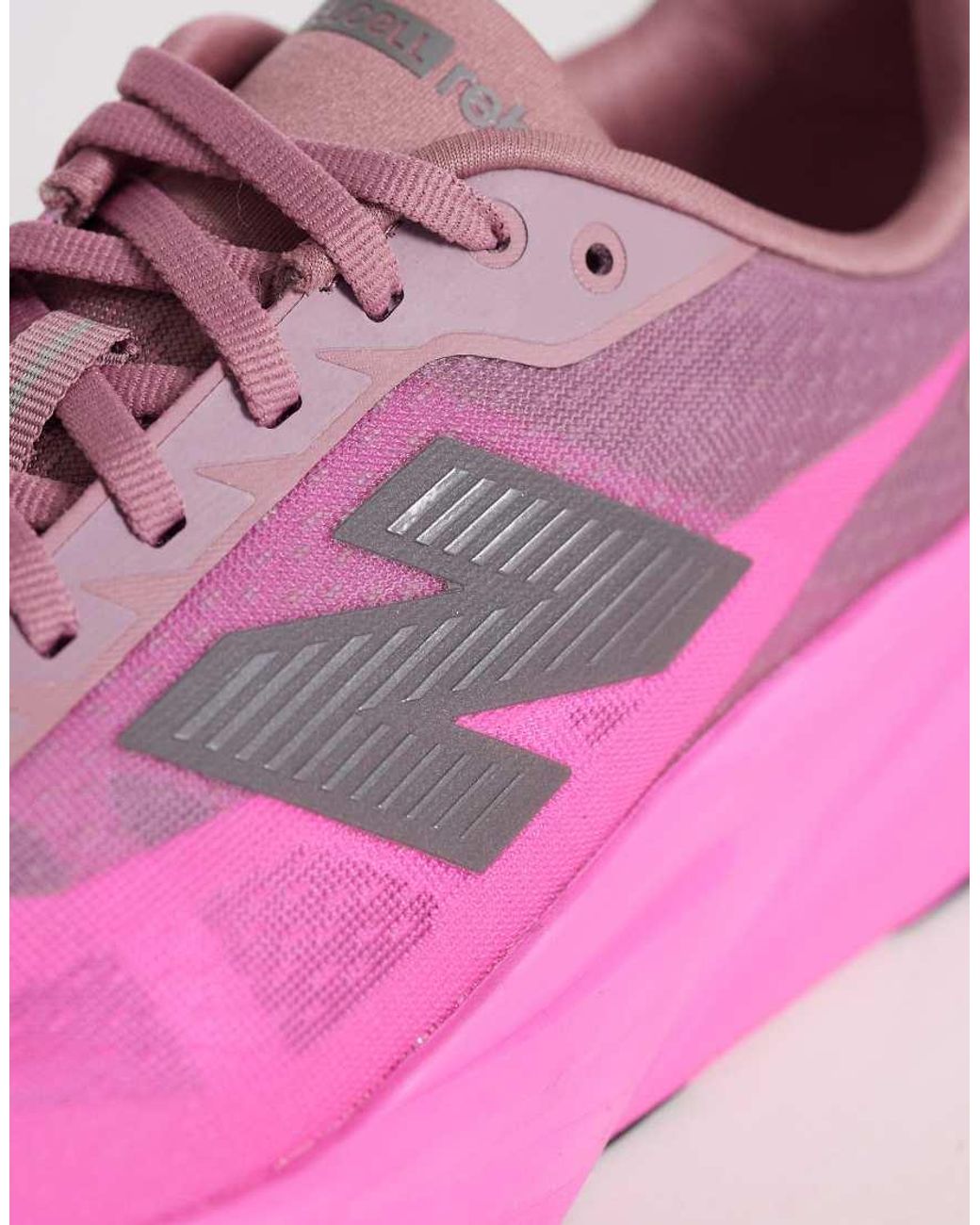 New Balance Pink Fuelcell Rebel V5 Running Trainers for men