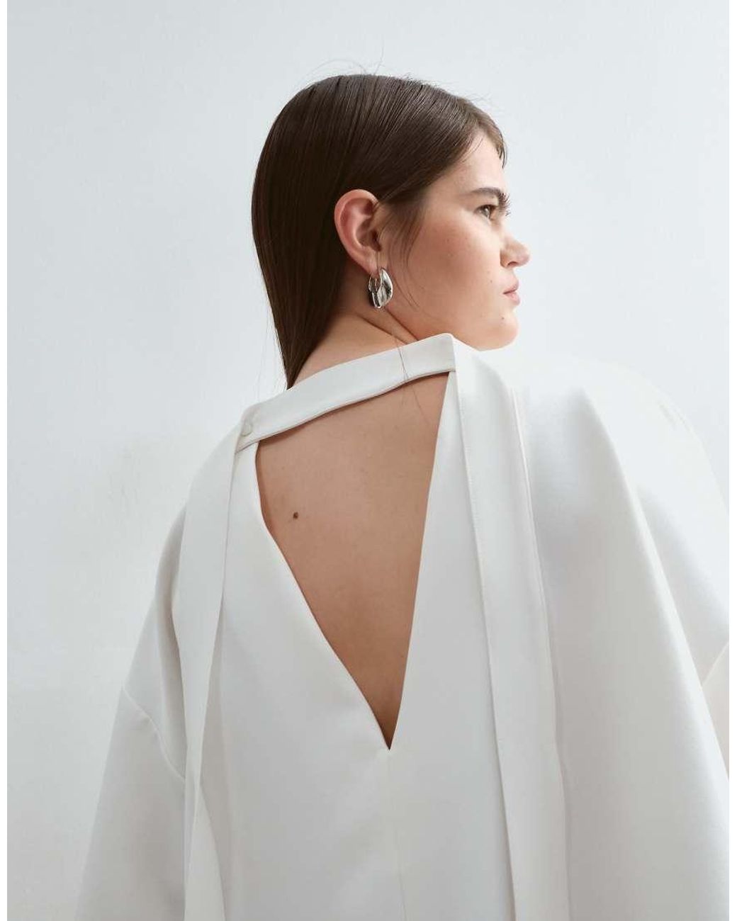 ARRANGE White Curve Boxy Top With Open Back