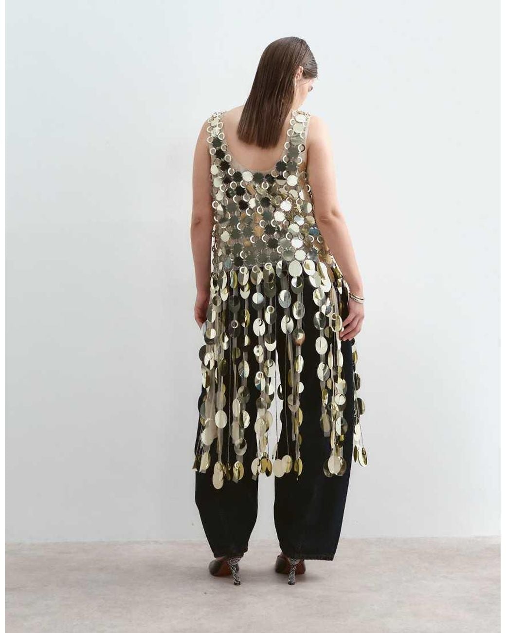 ARRANGE Metallic Curve Futurist Sequin Crop Top With Long 3D Fringe Hem