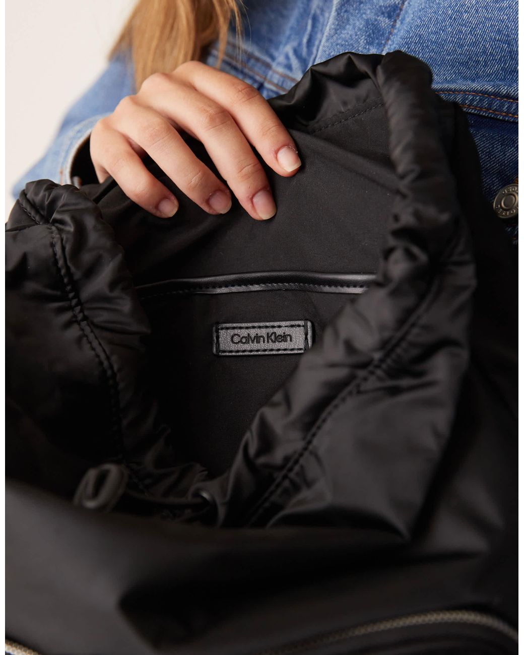 Calvin Klein Black Nylon Zipper Pockets Top Handles Backpack Calvin Klein Flap Zip Backpack | Black | FARFETCH main image 4
