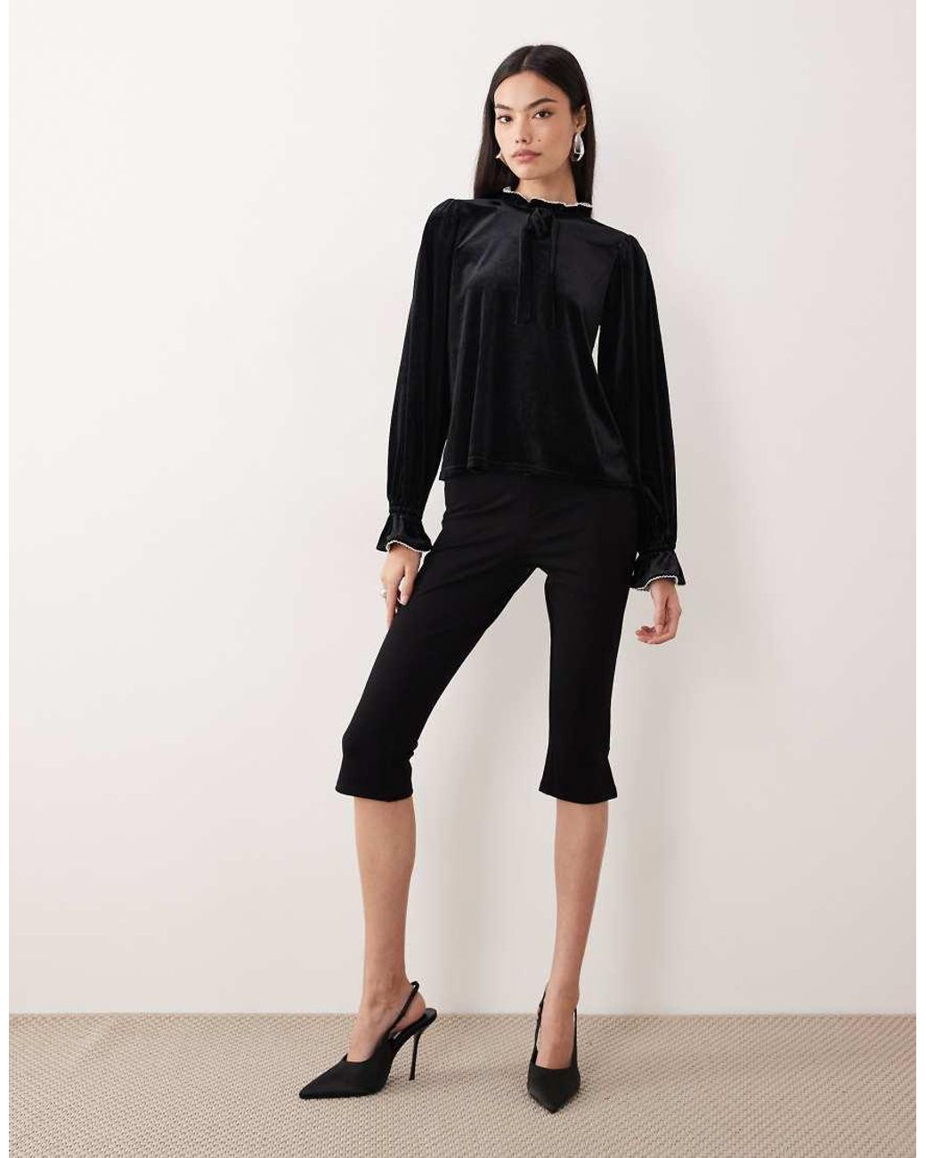 Nobody's Child Black Ruffle High Neck Blouse