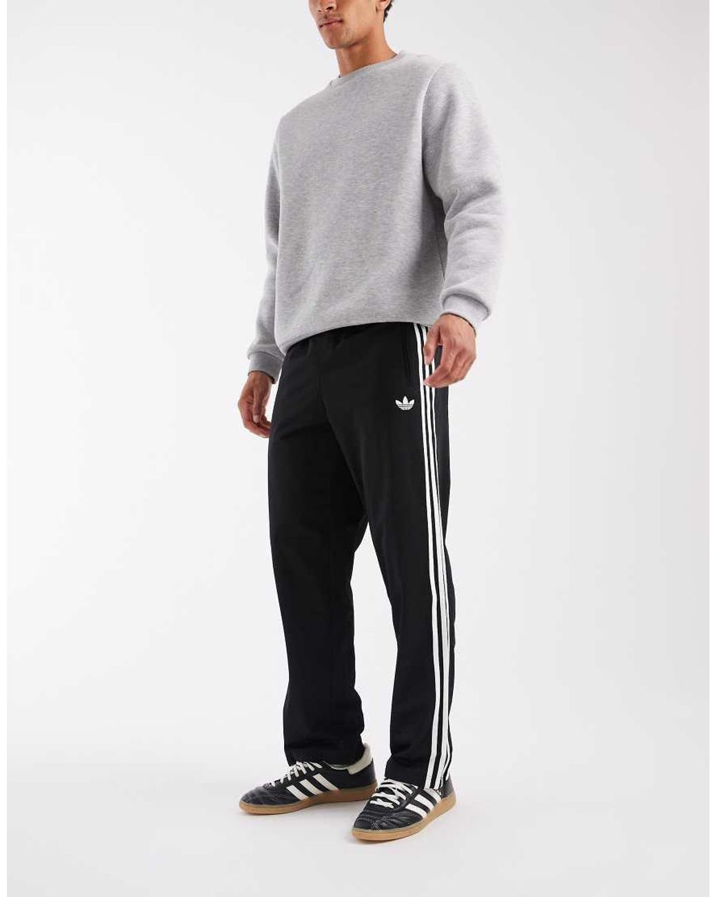 Adidas Originals Black Firebird Trackpants for men