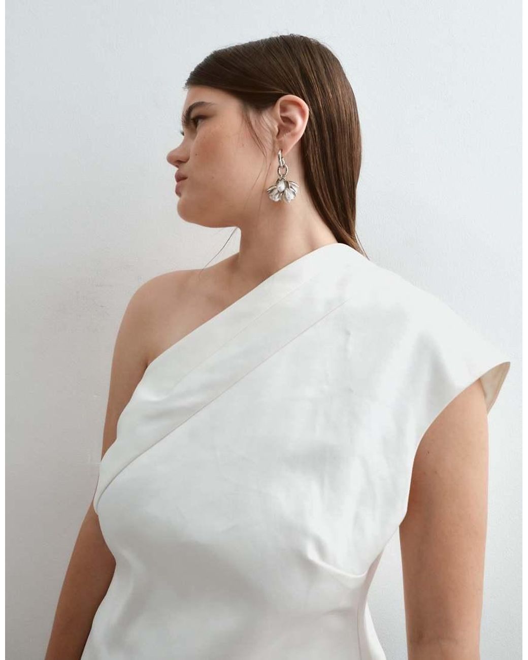 ARRANGE Black Curve One Shoulder Drape Top