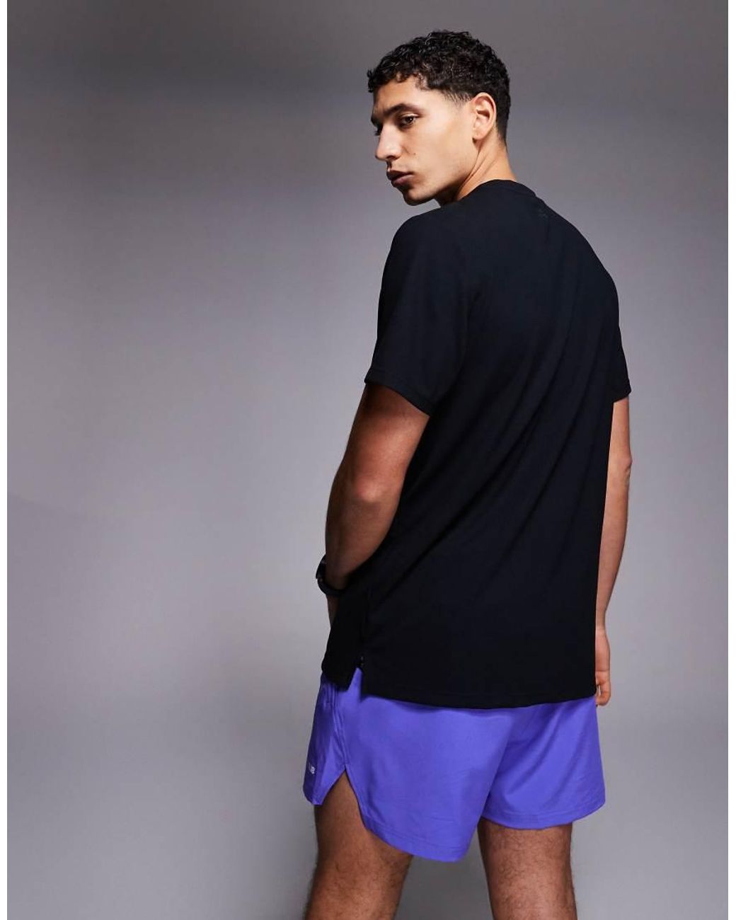4505 Purple 3 Inch Quick Dry Split Running Shorts With Zip Pockets And Reflective Graphic for men