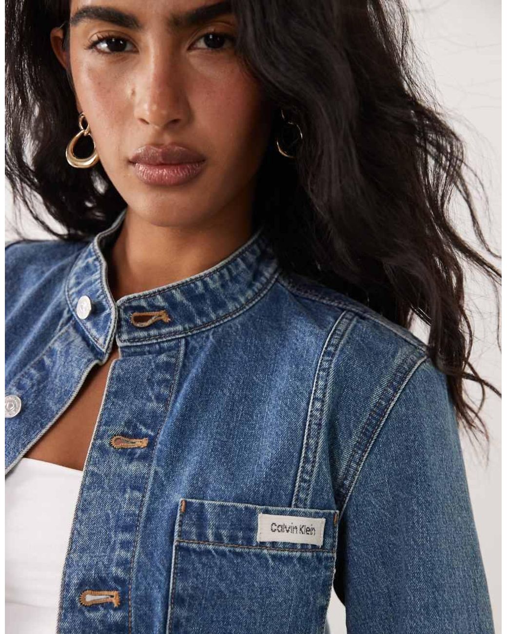 Calvin Klein Blue Cropped Button Up Denim Jacket With High Neck Detail