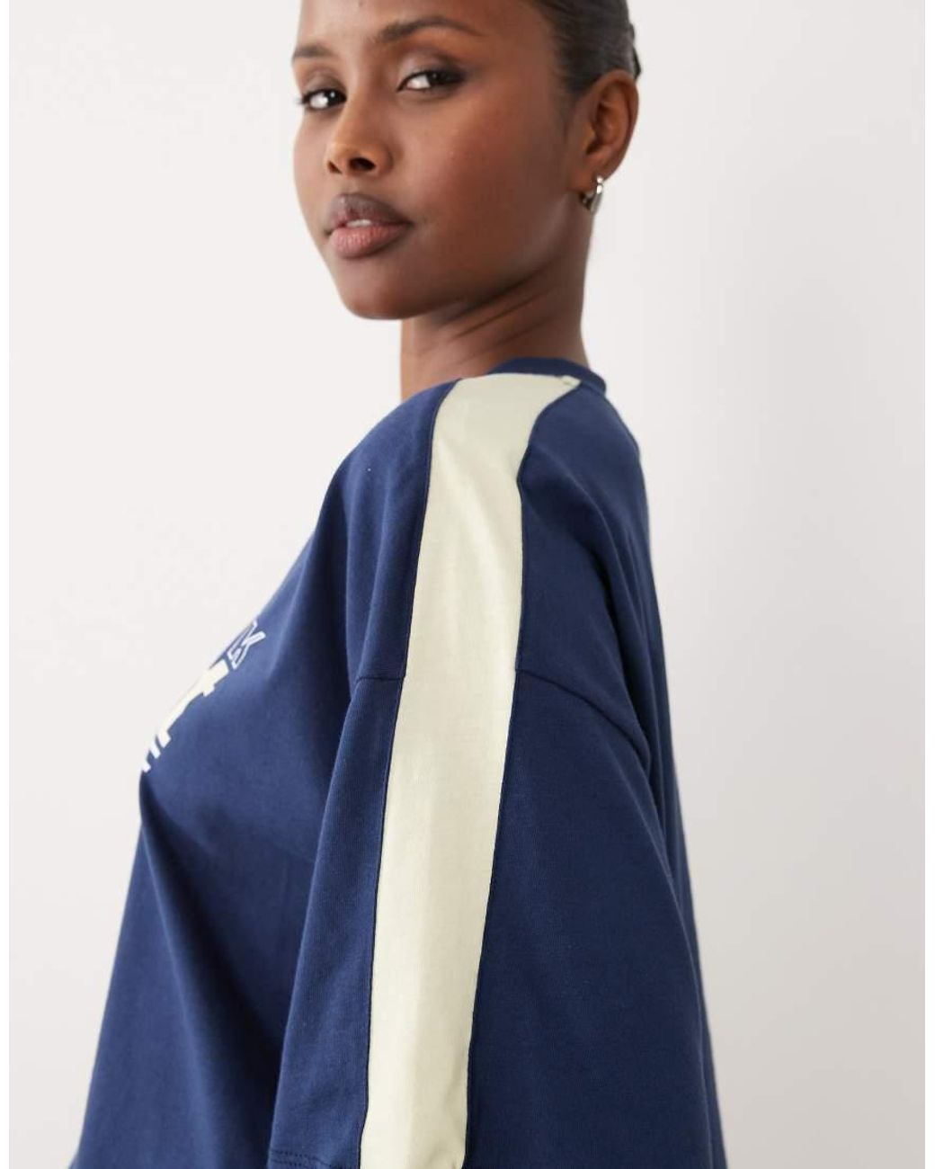 The Frolic Blue Exclusive V-neck Graphic Front Contrast Yellow Trim Cropped Football Jersey