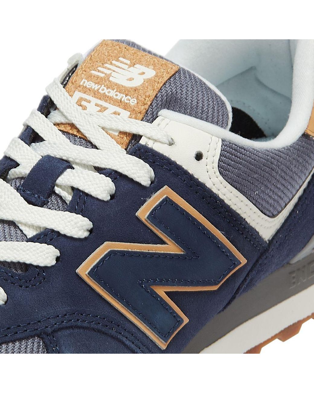 new balance 574 blue and tan