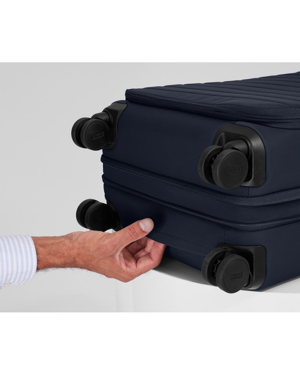 Away Travel Blue Softside Bigger Carry-On