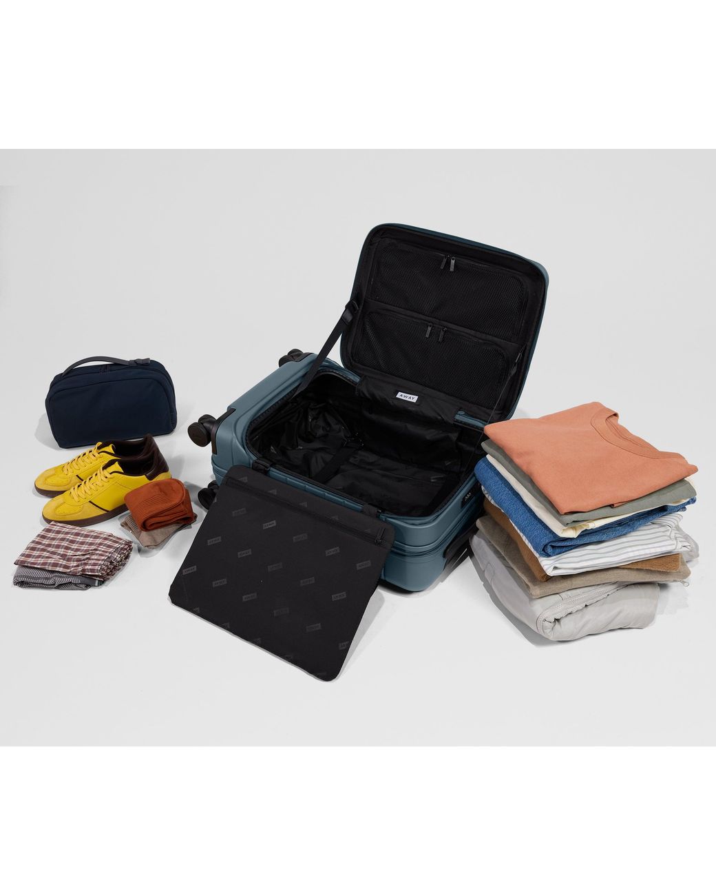 Away Travel Blue Topside Bigger Carry-On