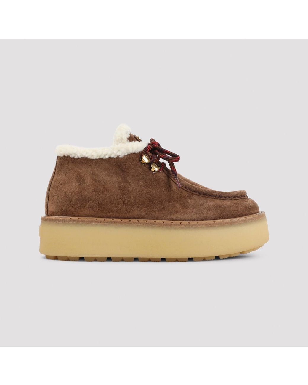 Bottines à lacets Prada en coloris Brown