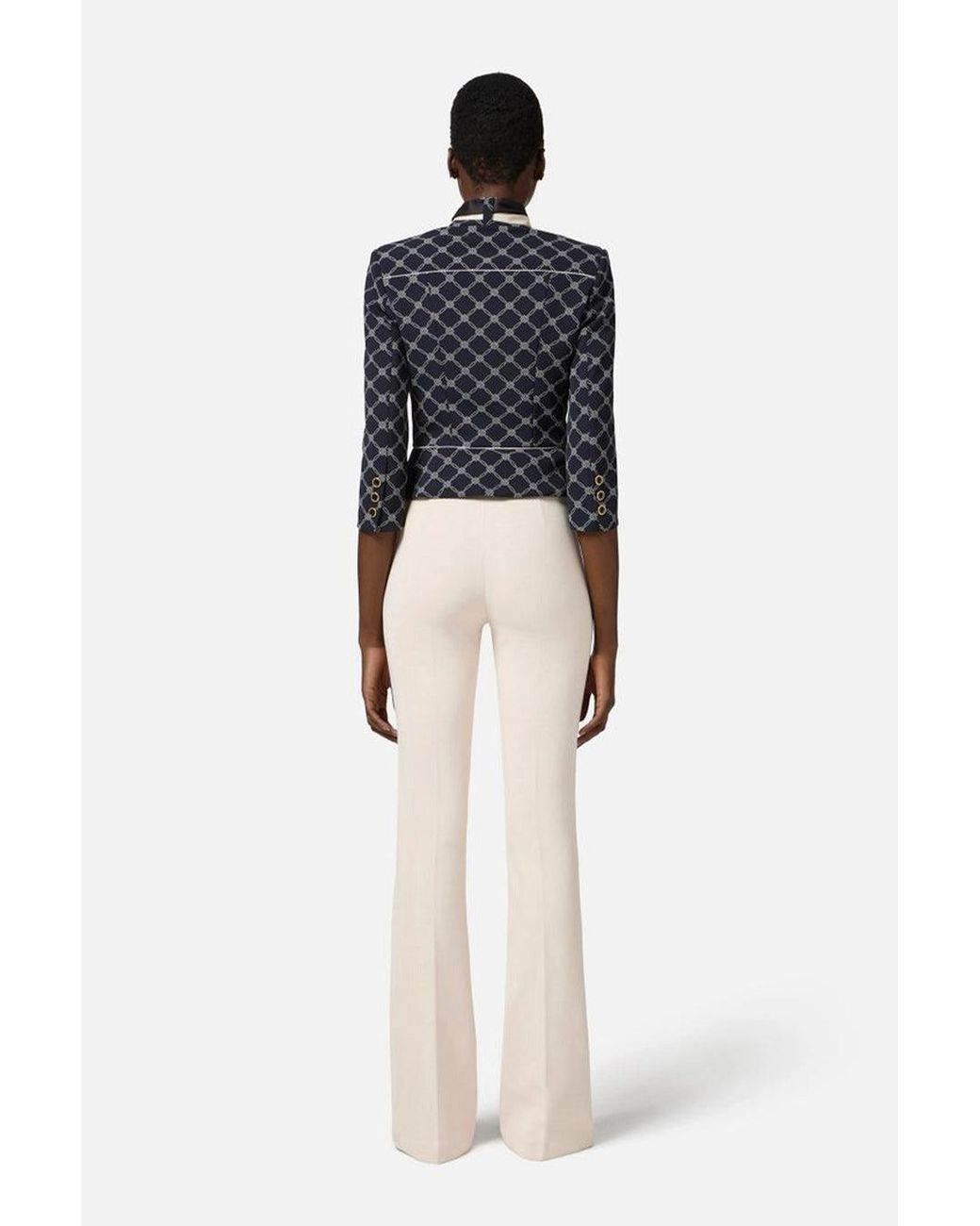 Elisabetta Franchi White Crepe Flared Trousers With Logo Plaque