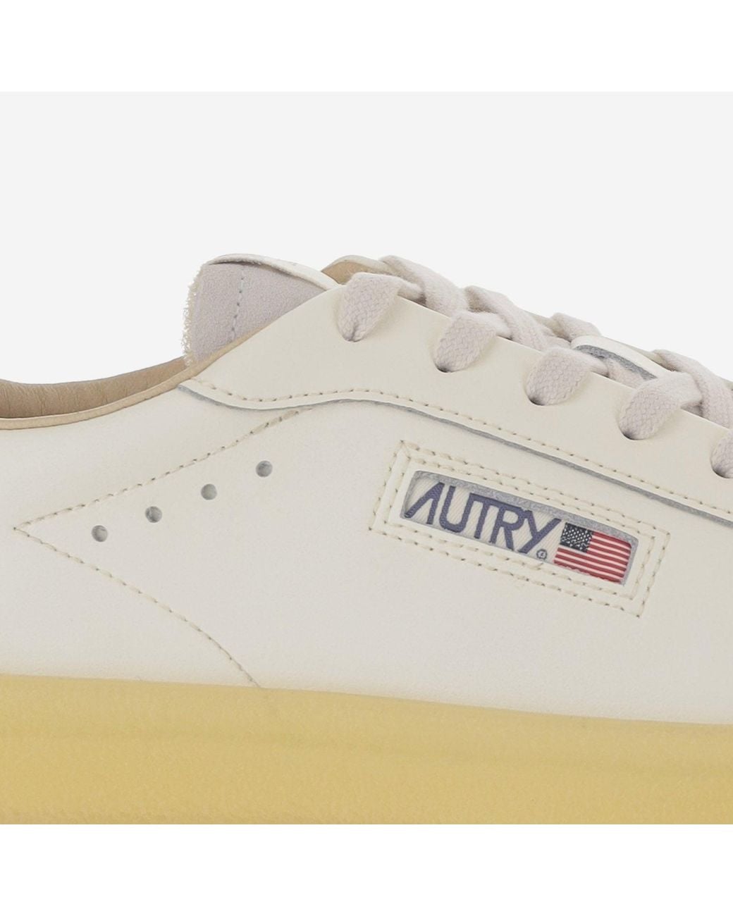 Autry White Low-Top Leather Sneakers With Padded Heel And Panel Design