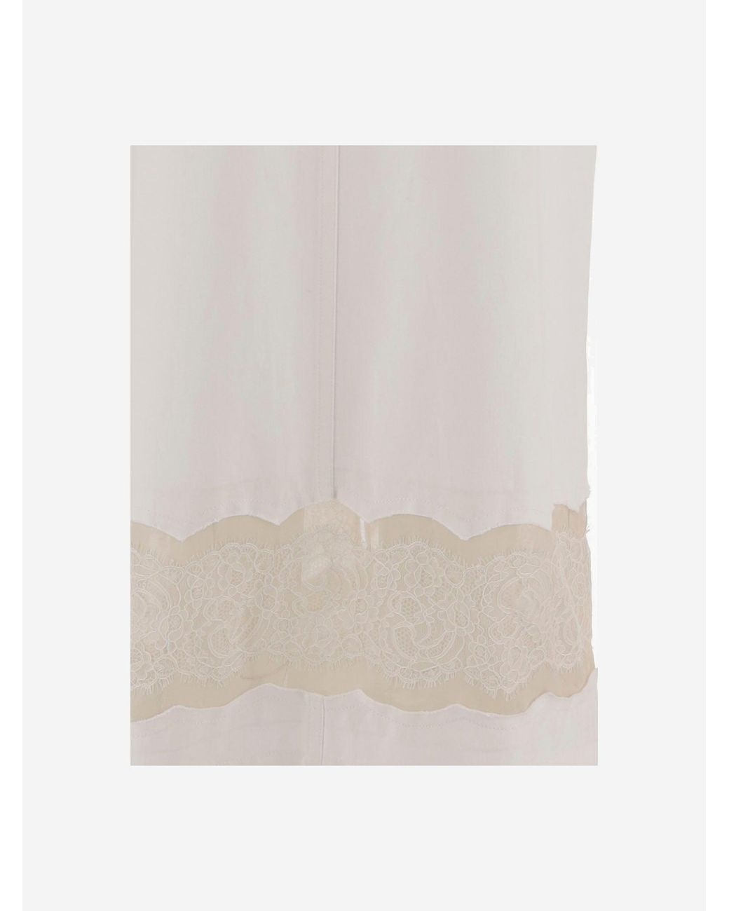 Carven White Geschnitzt