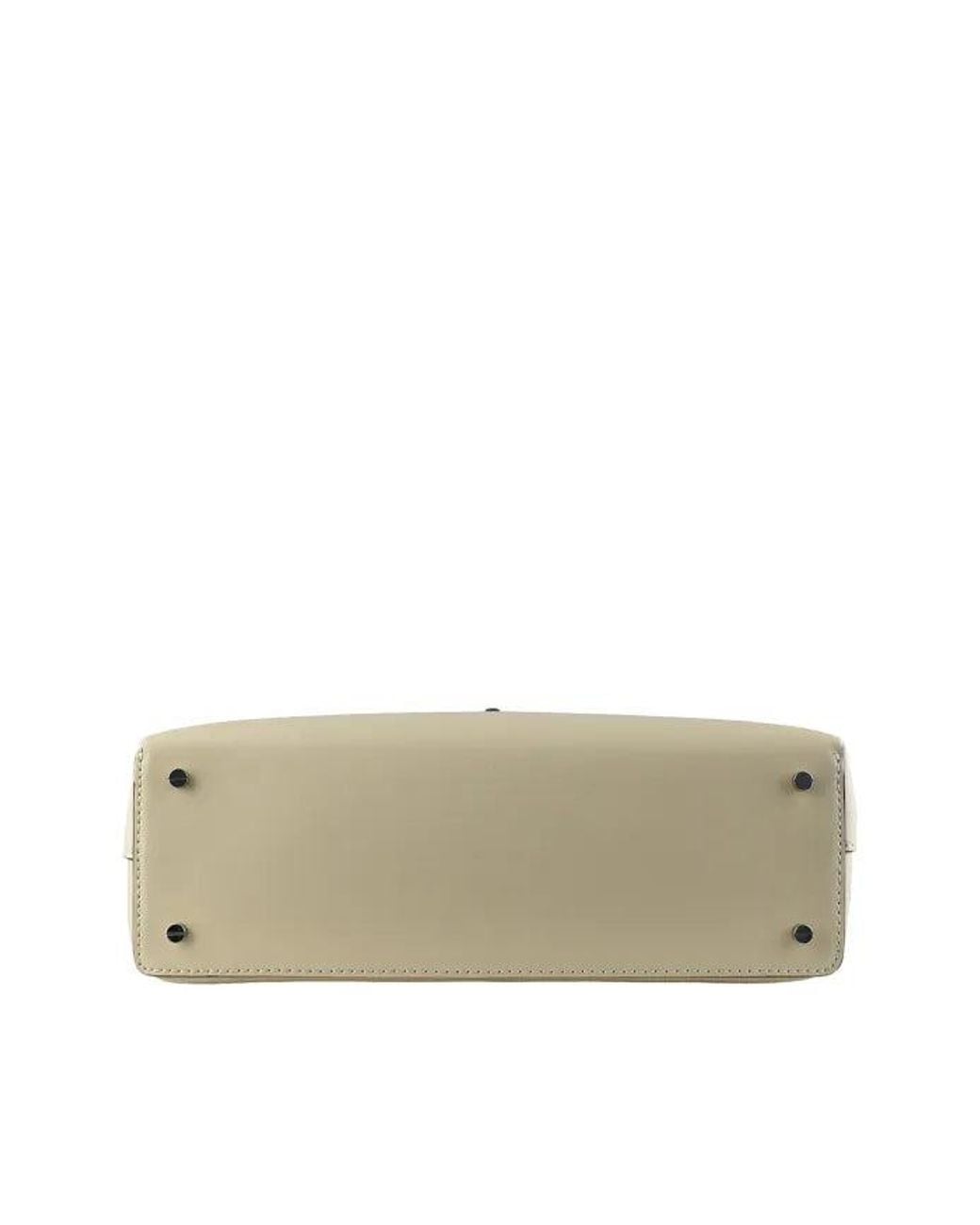 Totême Natural T Lock Clutch