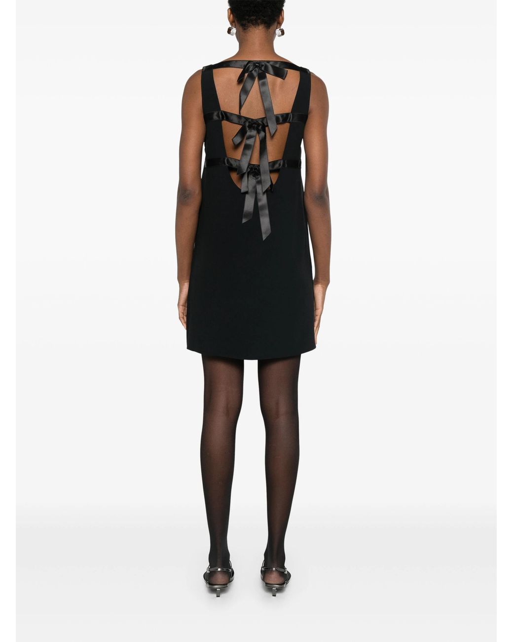 Minivestido con logo triangular de Prada de color Black