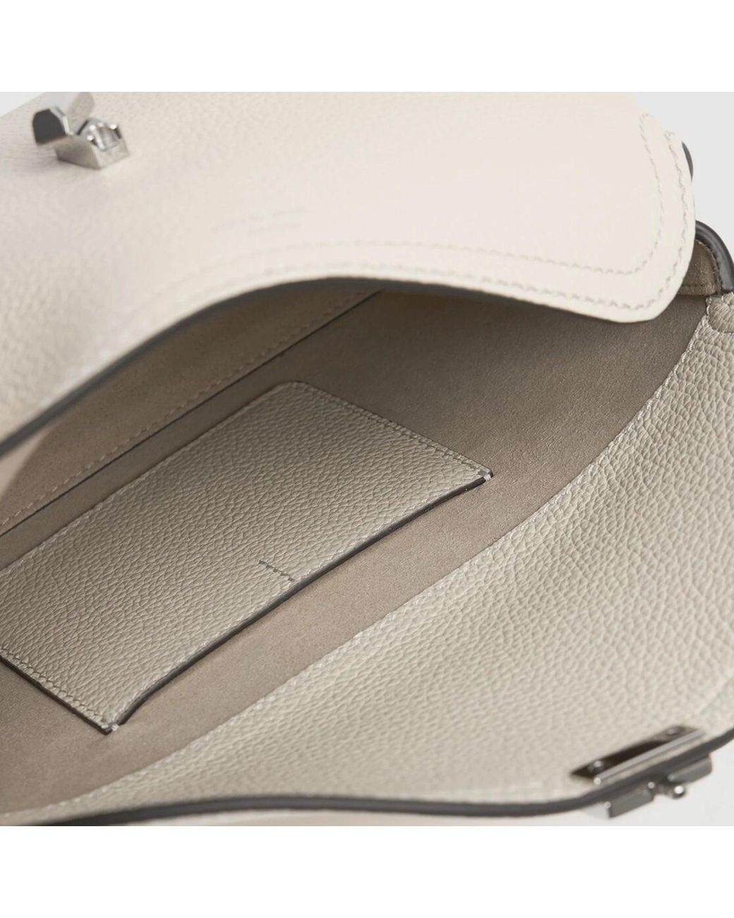 Totême Natural T-Lock Leather Clutch Bag