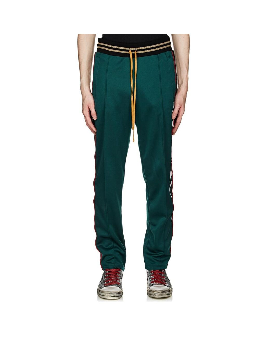 men's green track pants with red stripe