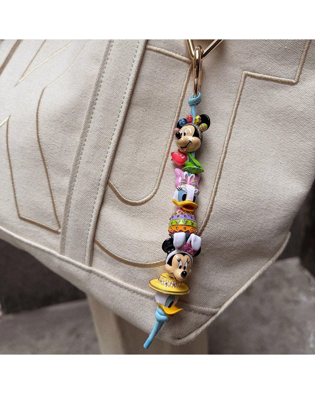 BaubleBar Disney Easter Friends Forever Bag Charm in Yellow | Lyst