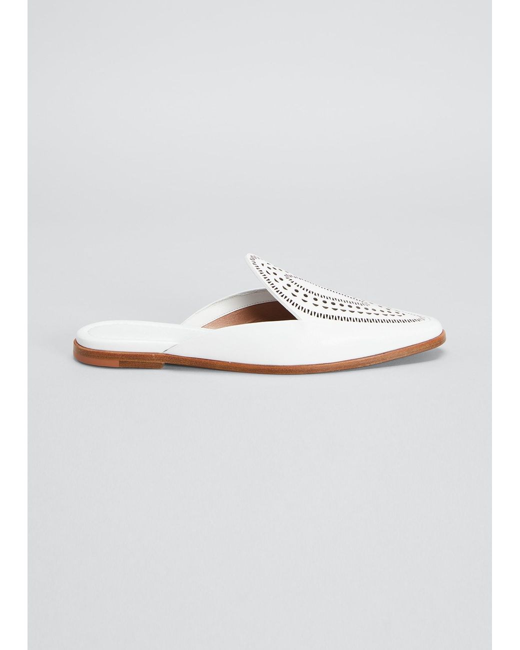 Alaïa Laser Cut Flat Slide Mules in White Lyst