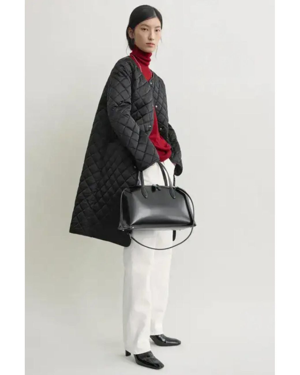 Totême Blue Quilted Collarless Coat