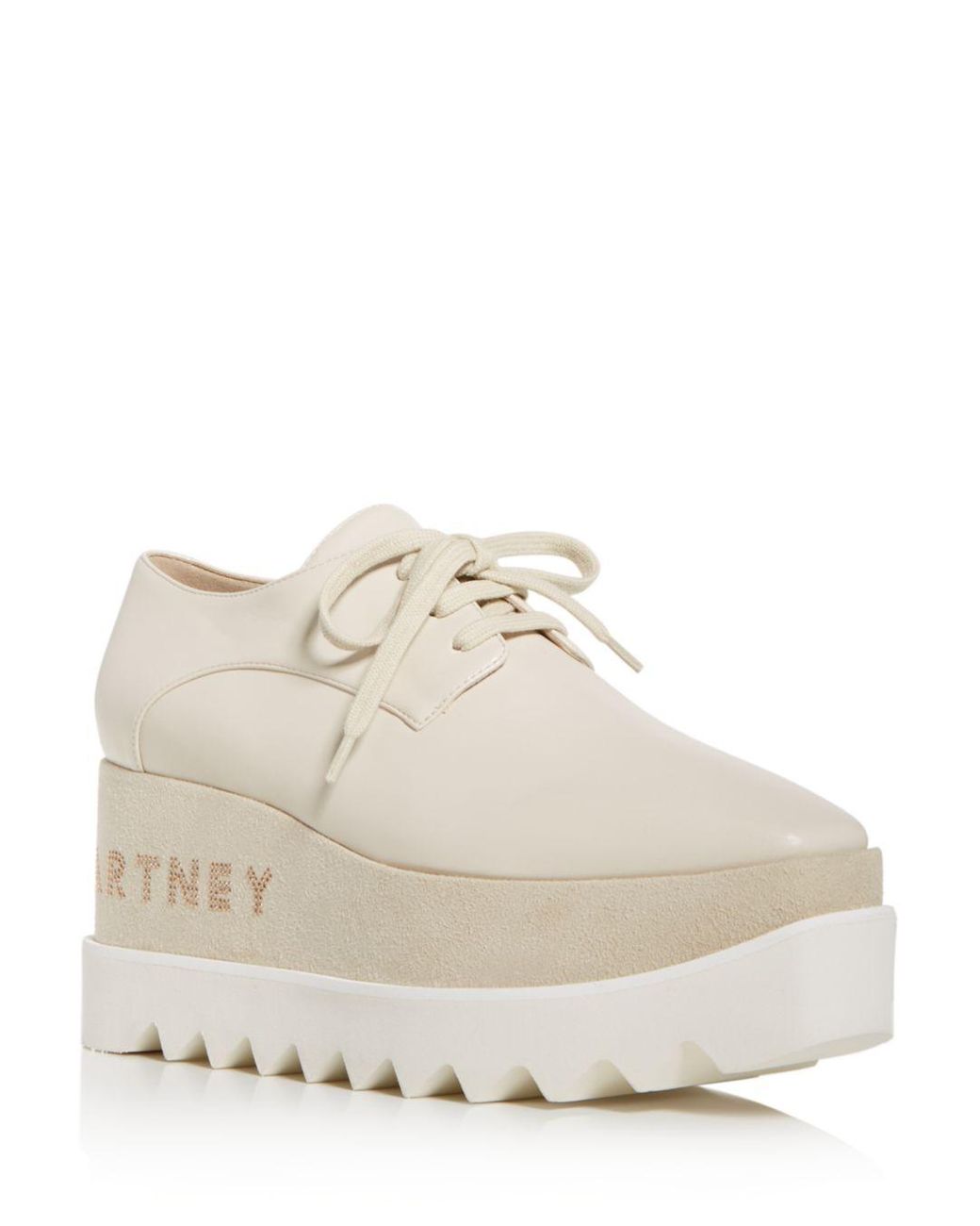 cream platform sneakers