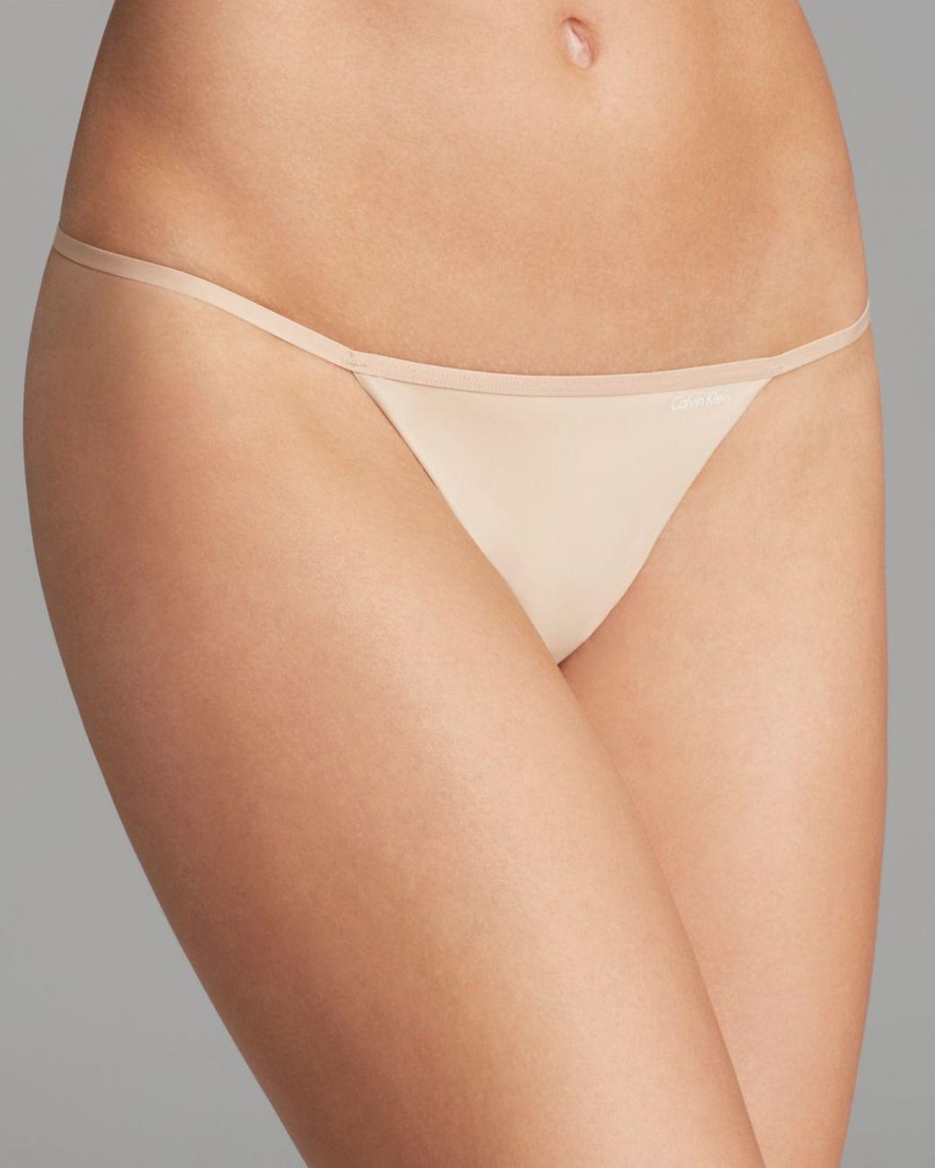 Calvin Klein Synthetic Sleek String Thong in Natural | Lyst