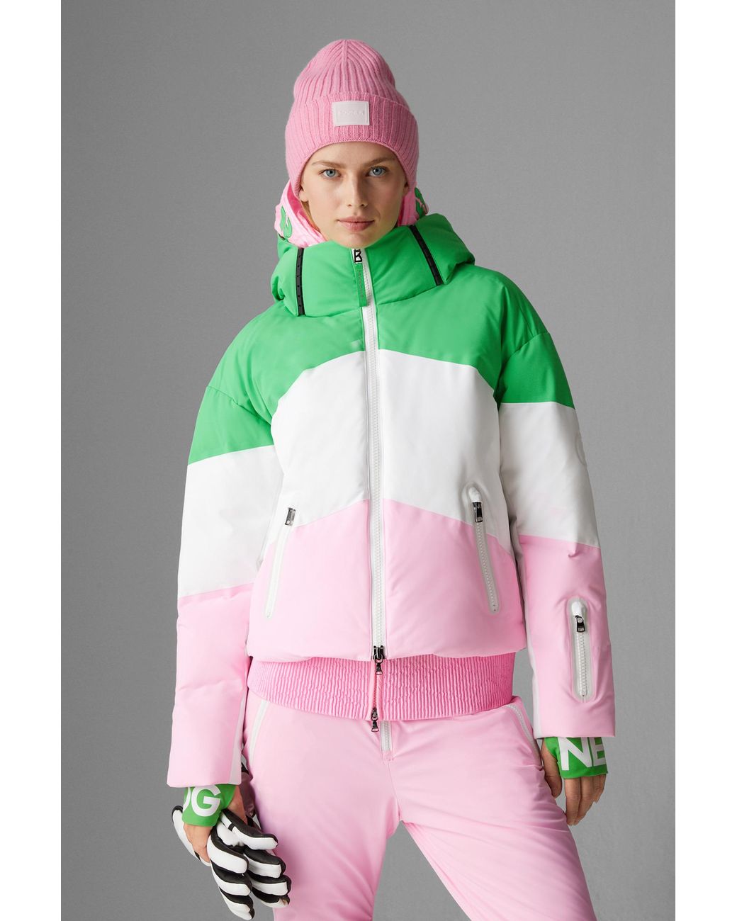 Pink and cheap green ski suit