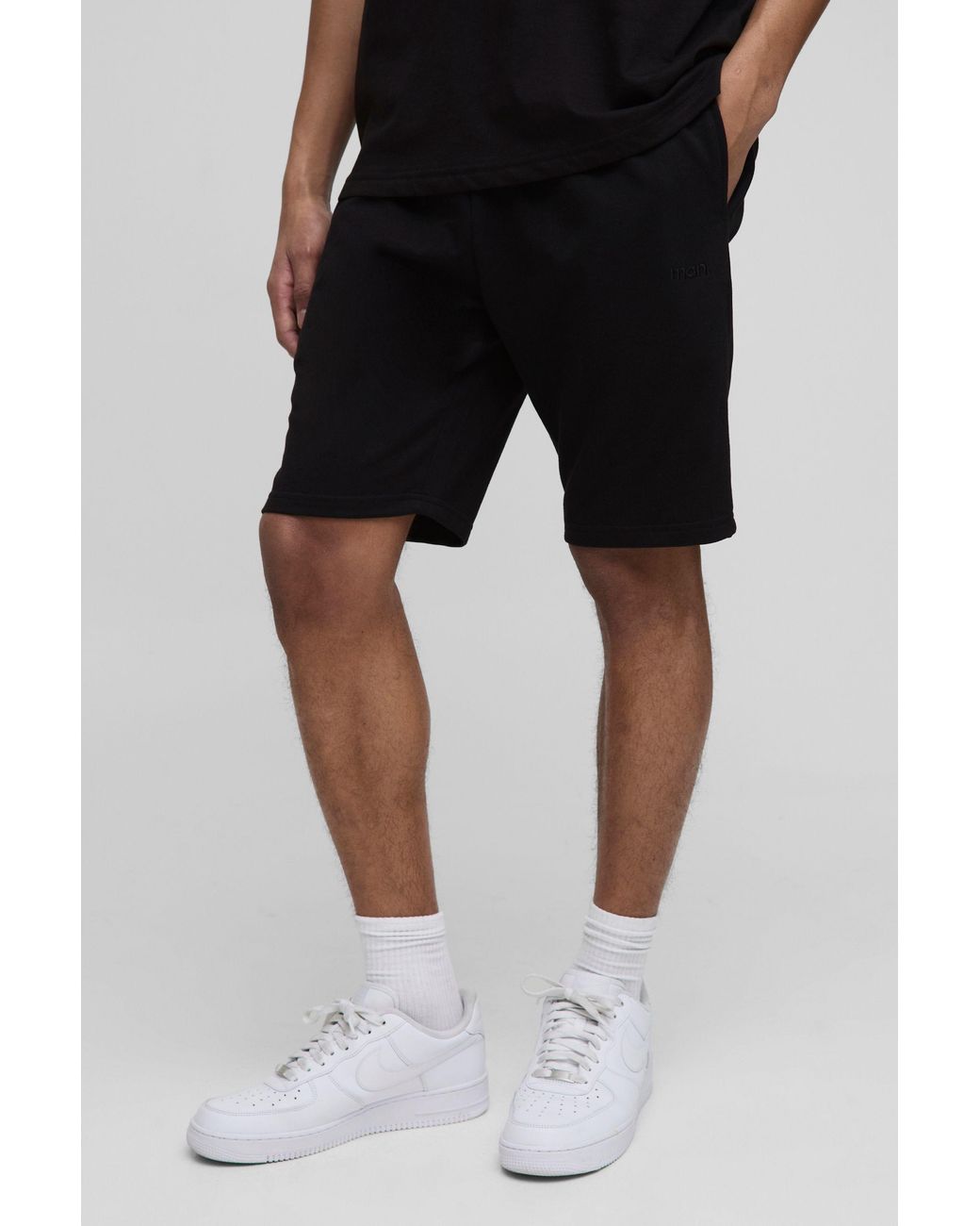 BoohooMAN Black Lightweight Basic Slim Fit Mid Length Shorts for men