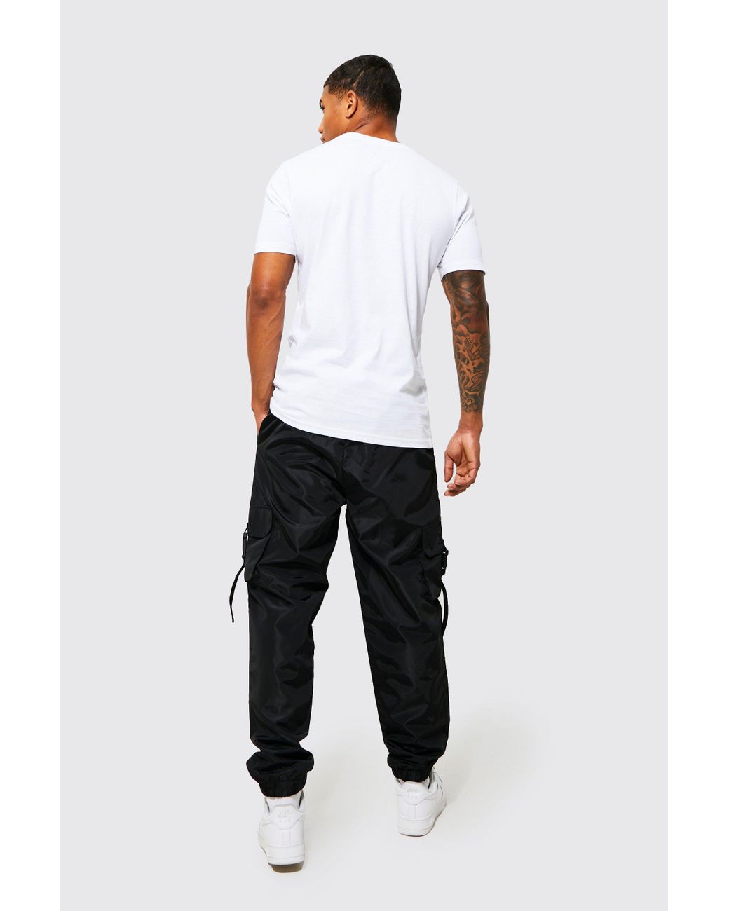 Boohoo Elasticated Waist Slim Fit Shell Cargo Sweatpant in Black Lyst UK