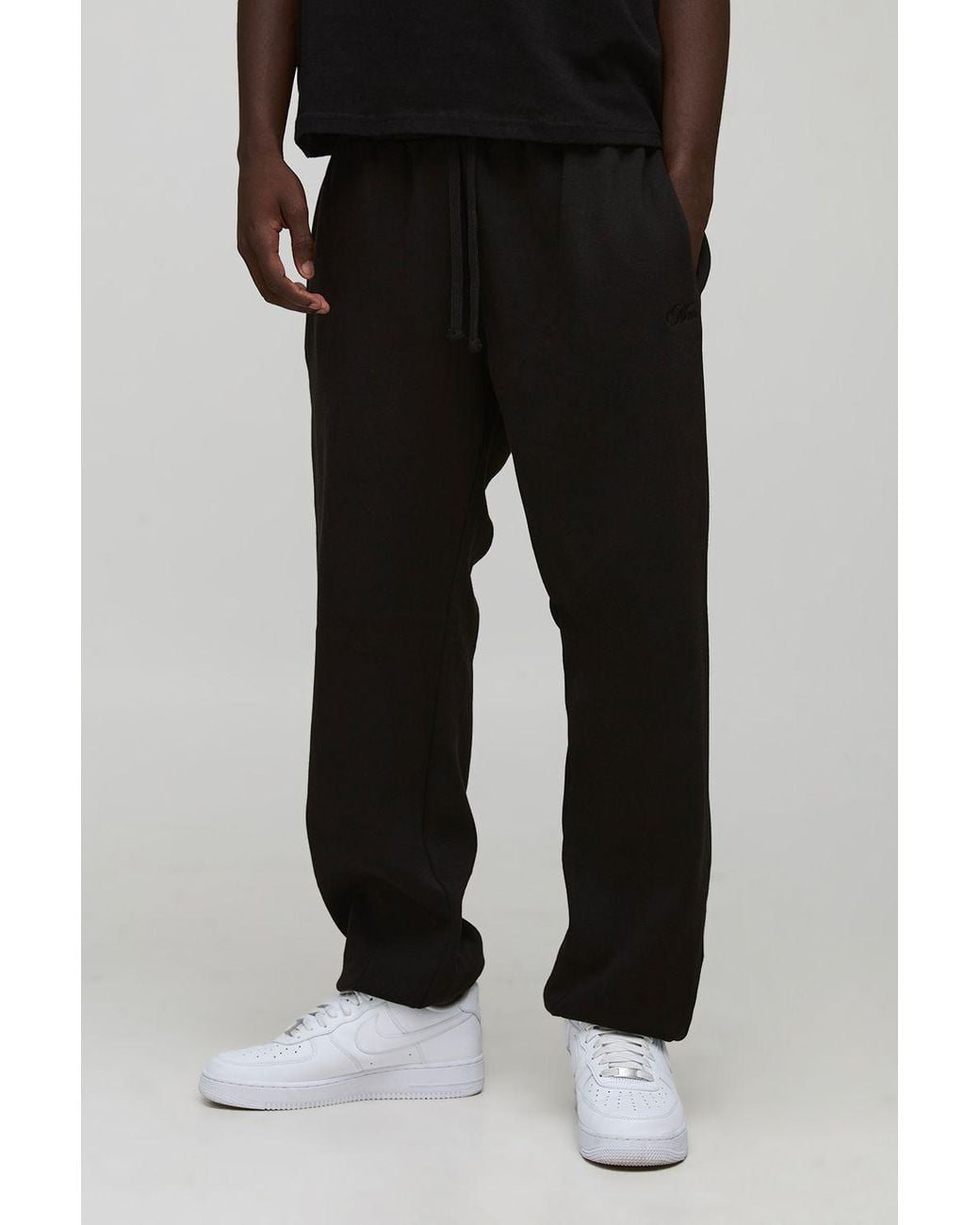 BoohooMAN Black Oversized Script Embroidered Cuffed Joggers for men
