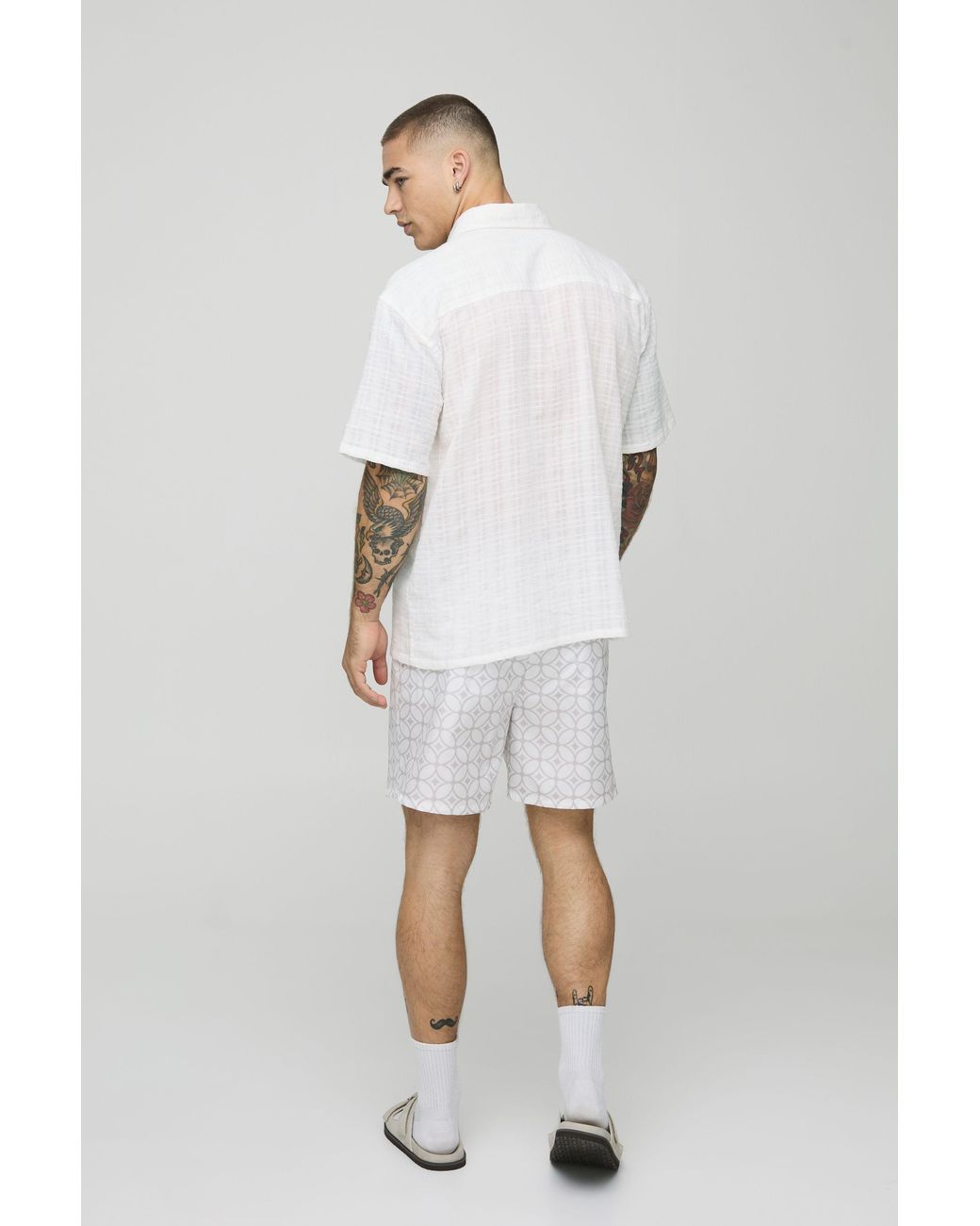 BoohooMAN White Abstract Pattern Mid Length Swim Trunks for men