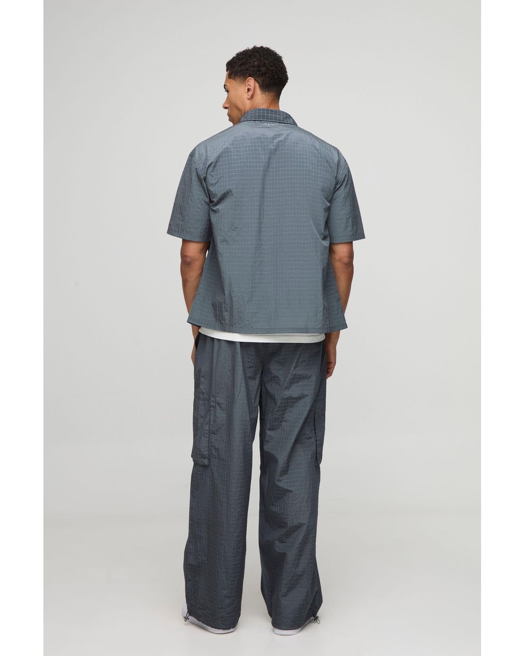 BoohooMAN Blue Parachute Technical Embossed Pants for men
